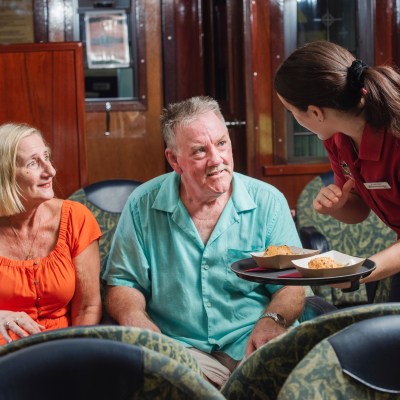 a group of people sitting at a table