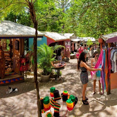 a group of people standing in a garden