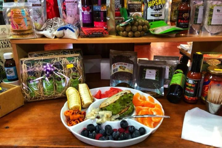 a plate of food and a bottle on a table