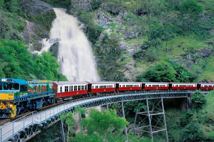 a large long train on a steel track