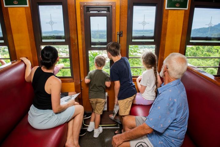 a group of people sitting on a bus